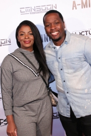 Comedian Calvin Evans and guest attend the premiere of ‘A-Minor’ at Raleigh Studios in Hollywood.