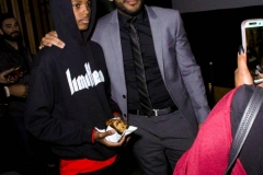 Director JR Strickland takes pictures with guests at the premiere of 'A-Minor' at Raleigh Studios in Hollywood.