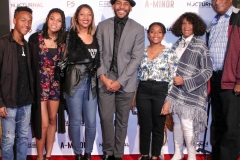 RJ Reliford, TayLore Reliford, LaTonya Reliford, director JR Strickland, TaMya Reliford, Evelyn Strickland, and Jerry Strickland attend the premiere of ‘A-Minor’ at Raleigh Studios in Hollywood.